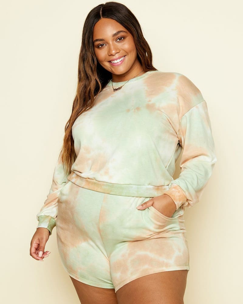 Front of a model wearing a size L Hayden Cruz Short in Sage Green by Dippin' Daisy's Swimwear. | dia_product_style_image_id:239604